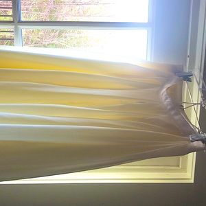 Off white Easley midi skirt. Can wear it all year long. It’s machine washable